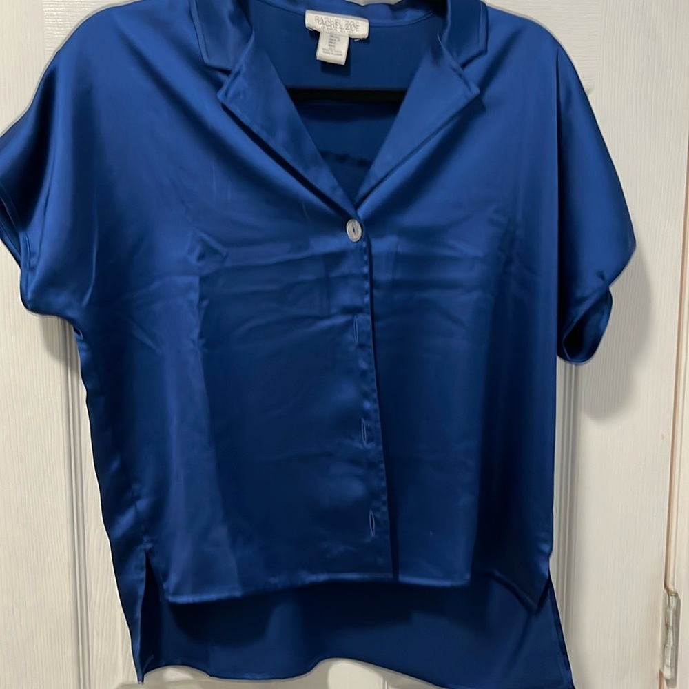 Blue satin top.